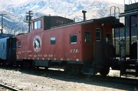 Great Northern Railway Caboose X-78 in red color scheme at Wenatchee Appleyard, Washington.