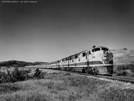 Great Northern diesel locomotive 501 leads the eastbound Empire Builder at Bison, Montana.  Used ...