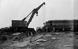Great Northern Crane X1737 and Diesel Locomotive 472A at Quincy, Washington, undated