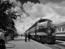 Great Northern diesel locomotive 355 leads the eastbound Empire Builder at Havre, Montana  The pa...