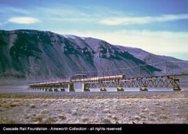 Boxcab electric locomotives lead a train at Beverly, Washington in the late 1950s.