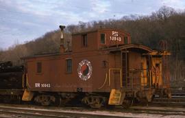 Burlington Northern wood caboose 10943 at Kansas City, Missouri, in 1975.