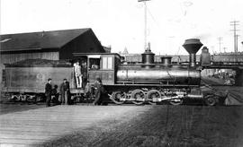 Columbia and Puget Sound Railroad steam locomotive number 9 at Seattle, Washington, circa 1890.