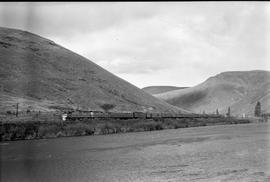 Amtrak passenger train number 8 in Yakima River Canyon, Washington on November 17, 1977.