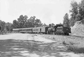 Sierra Railway Steam Locomotive Number 28 With Passenger Train at Jamestown, California in June 1...