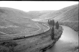 Amtrak passenger train number 7 in Yakima River Canyon, Washington on November 17, 1977.