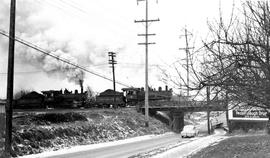 Pacific Coast Railroad steam locomotives number 15 and 14 at East Auburn, Washington, circa 1950.