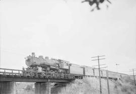 Northern Pacific passenger train DHE at East Auburn, Washington, in 1954.