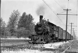 Pacific Coast Railroad freight train at Allentown, Washington, circa 1940.