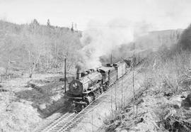 Northern Pacific mixed train number 591 between Littell and Pe Ell, Washington, in 1954.