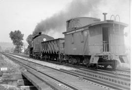 A Northern Pacific steam locomotive at Black River, Washington, circa 1941.