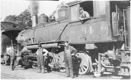 Northern Pacific steam locomotive 64 at Olympia, Washington, circa 1910.
