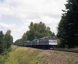 Amtrak diesel locomotive 230 near East Olympia, Washington in 1981.