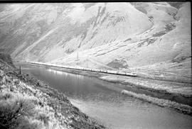 Amtrak passenger train number 7 in Yakima River Canyon, Washington on November 17, 1977.