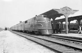 Chicago, Rock Island & Pacific Railroad diesel locomotive with The Rocket passenger train at ...