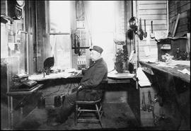 Northern Pacific telegraph operator at Machias, Washington, circa 1920.