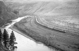 Amtrak passenger train number 7 in Yakima River Canyon, Washington, circa 1980.