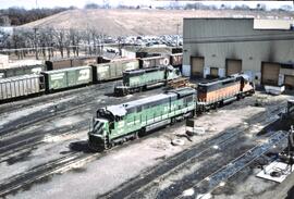 Burlington Northern Diesel Locomotives Numbers 5504 and 7029, and a Milwaukee Road Diesel Locomot...
