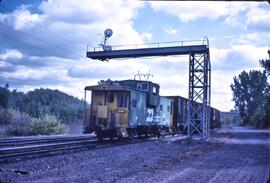 Burlington Northern Caboose Number 10029 and Coal Hoppers at Saint Paul, Minnesota in 1980