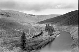 Amtrak passenger train number 8 in Yakima River Canyon, Washington on November 17, 1977.