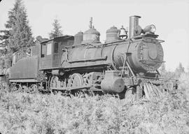 Polson Logging Company Steam Locomotive Number 18 at Railroad Camp, Washington, circa 1948.