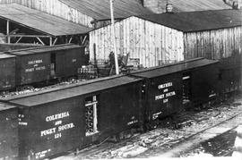 Columbia and Puget Sound Railroad freight cars number 124 at Taylor, Washington in 1914.