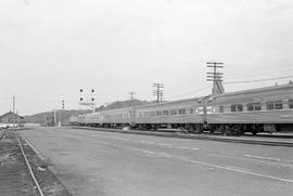 Amtrak passenger train number 14 leaves Centralia, Washington on May 14, 1975.