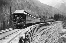 Canadian Pacific Railway passenger train at Illecillewaet, British Columbia in June 1886.