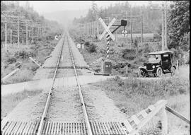 Northern Pacific grade crossing at McKenna, Washington, circa 1927.