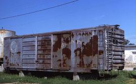 Northern Pacific 50-foot, double sliding door box car 38501 on blocks in Rushville, Missouri, in ...