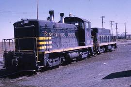 Northern Pacific 119, and slug ET-1 wait near the Pasco, Washington, classification yard in 1970.